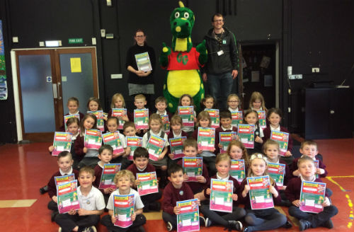 Pupils at Llangunnor School are presented with their Kerbrcaft certificates by Gary GoSafe and Carmarthenshire County Council’s Kerbcraft staff and trainers.